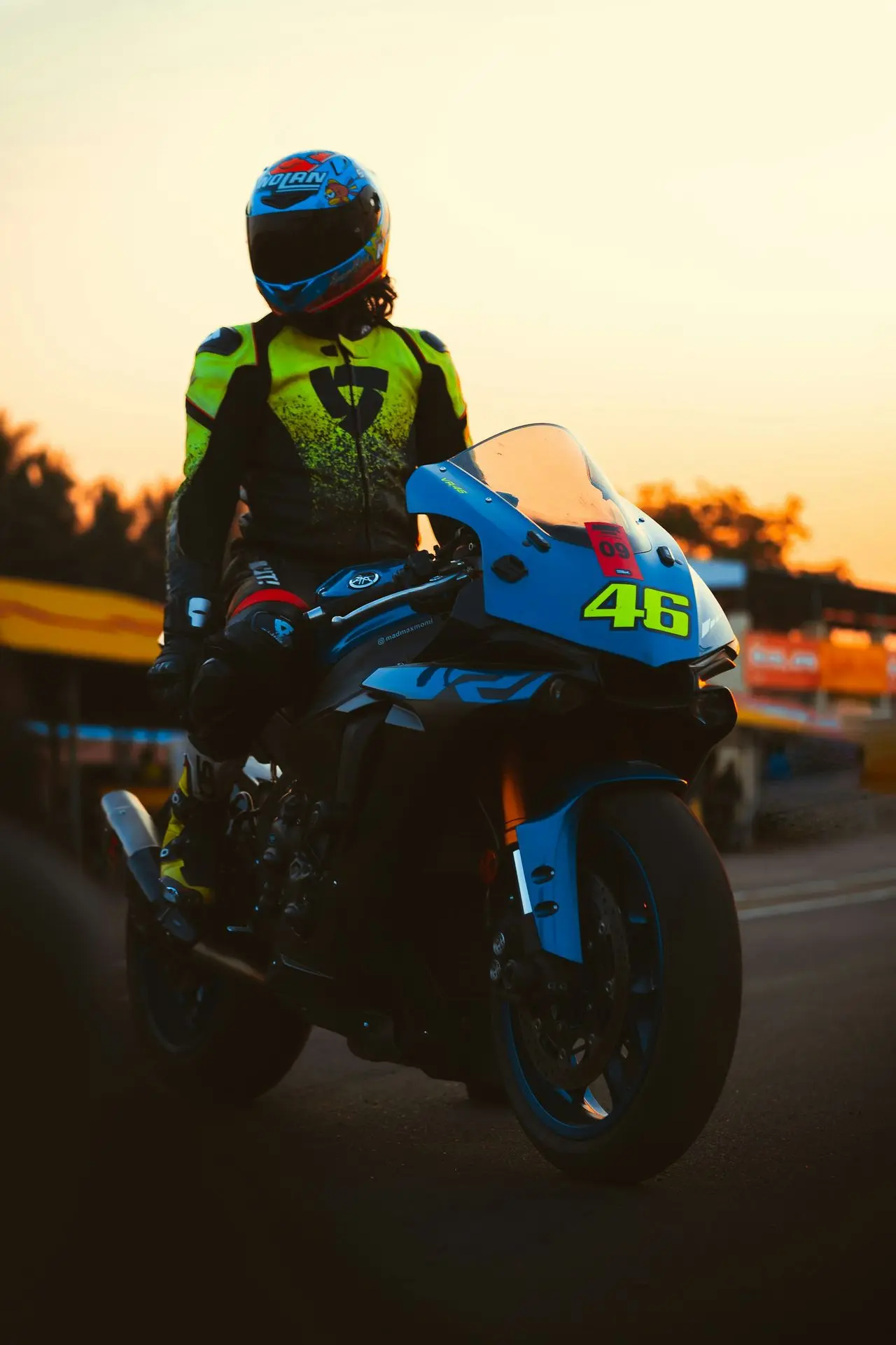 man in black jacket riding motorcycle during daytime